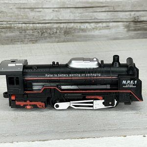 Black and Silver Toy Train Engine